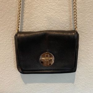 Kate Space crossbody purse (black) gold accents and pink interior